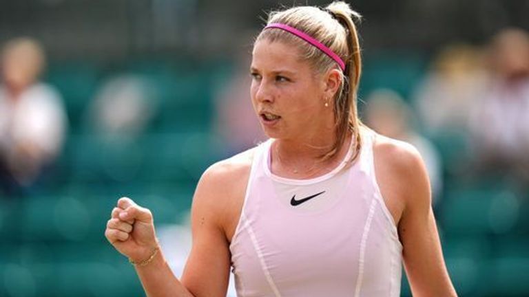 Great Britain's Hannah Klugman celebrates a point against Great Britain's Harriet Dart (not pictured) in the Women's Singles first round mat
