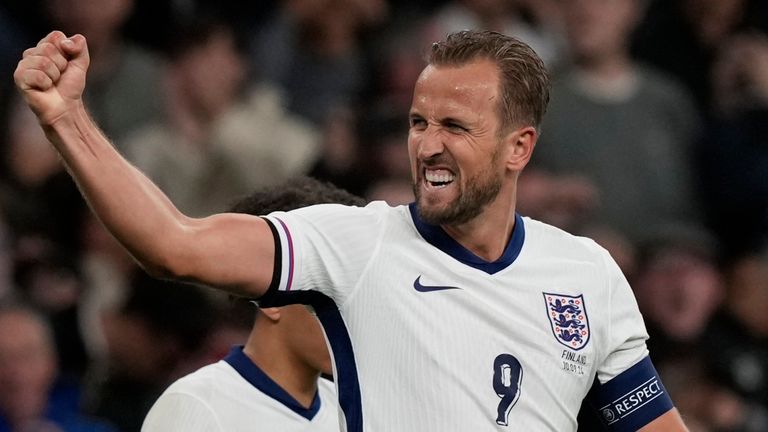 FILE - England's Harry Kane, left, celebrates after scoring his side's second goal during the Group F UEFA Nations League soccer match between England and Finland at Wembley Stadium in London, Tuesday, Sept. 10, 2024. (AP Photo/Frank Augstein, File)