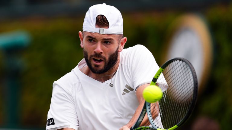 Jacob Fearnley of Great Britain playing in the men's singles at Wimbledon 