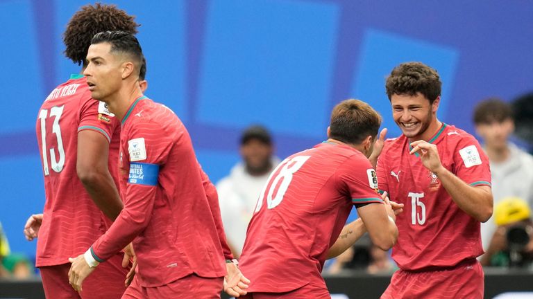 Portugal's Joao Neves, right, celebrates after scoring the opening goal of his team during the World Cup Group K soccer match between Portugal and Congo in Houston, Wednesday, June 17, 2026. (AP Photo/Karen Warren)