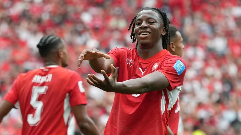 Switzerland's Johan Manzambi celebrates after scoring against Canada (AP Photo/Abbie Parr)
