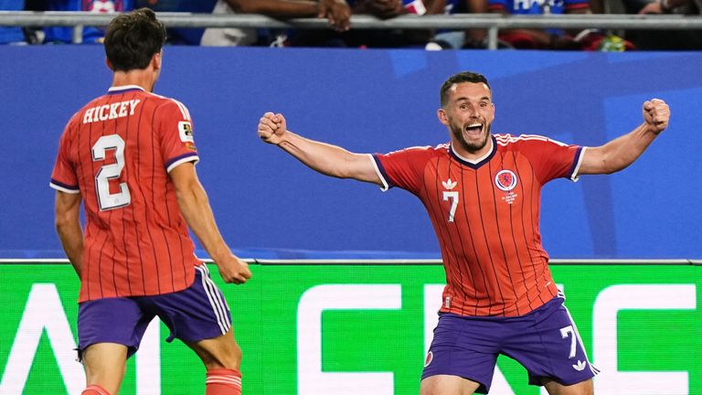 Scotland's John McGinn celebrates with Aaron Hickey (2) after scoring against Haiti