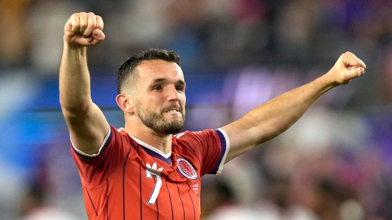 John McGinn, de Escocia, celebra a tiempo completo después de que su gol ganara el primer partido de la Copa Mundial contra Haití