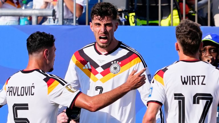 Germany's Kai Havertz (7) celebrates after scoring his side's opening goal during the World Cup round of 32 soccer match 