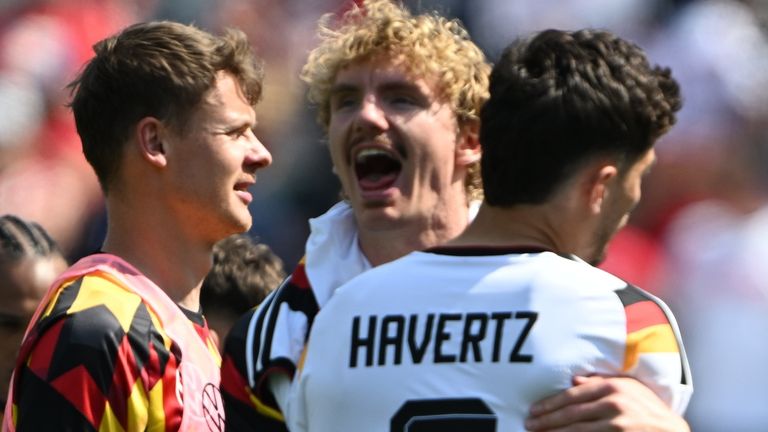06 June 2026, USA, Chicago: Soccer, men, national team, preparation for the 2026 World Cup, international match, USA - Germany at Soldier Field. Nick Woltemade (Germany) celebrates with Kai Havertz (Germany) after the match. Photo by: Federico Gambarini/picture-alliance/dpa/AP Images