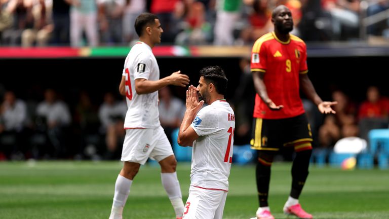 Hossein Kanani reacts after Thiabaut Courtois saves his shot in Iran's match with Belgium