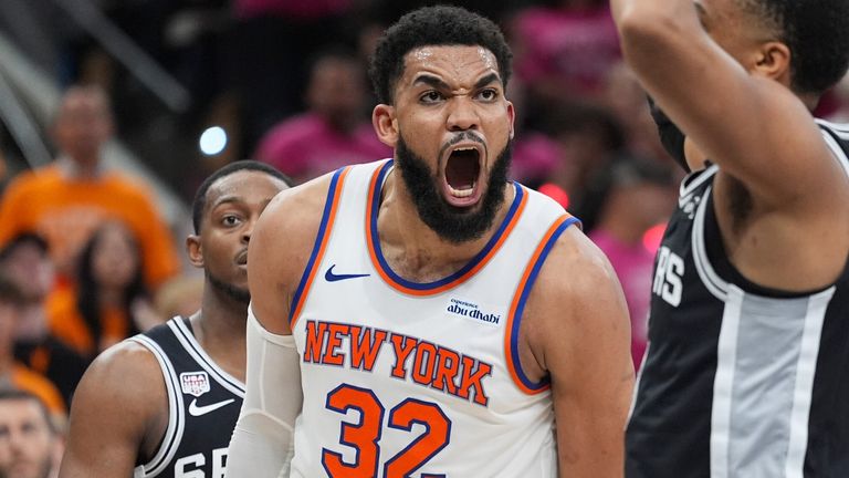New York Knicks center Karl-Anthony Towns (32) yells during the second half of Game 1 of the NBA Finals in San Antonio (AP Photo/Eric Gay)