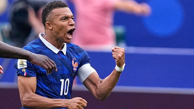 France's Kylian Mbappe (10) celebrates after scoring his team's first goal during the World Cup Group I soccer match between France and Iraq in Philadelphia, Monday, June 22, 2026. (AP Photo/Petr David Josek)