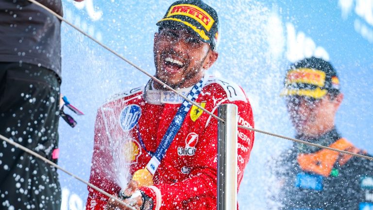Lewis Hamilton sprays champagne after winning in Barcelona