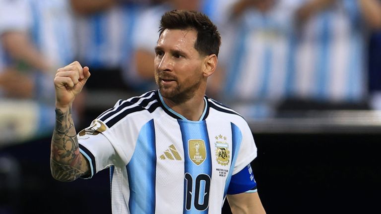 Lionel MESSI of Argentina gestures after scoring the opening goal in the first half of the Group J match