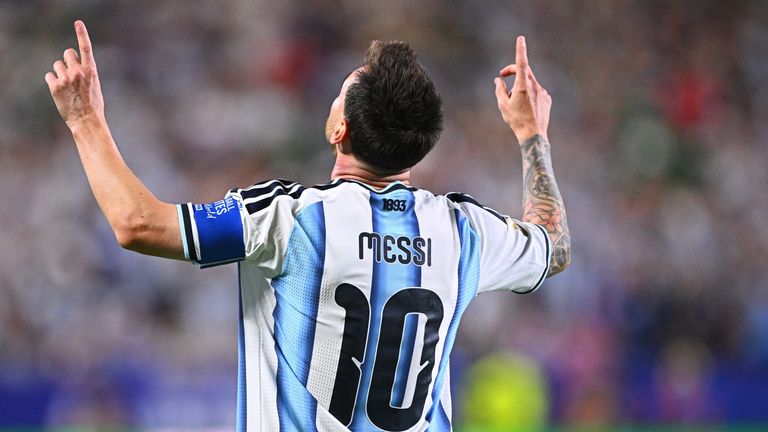 Lionel Messi celebrates against Algeria