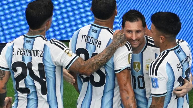 Lionel Messi is congratulated after becoming the all-time leading World Cup goalscorer