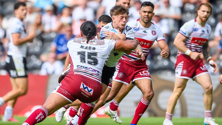 Hull FC's Logan Moy is tackled by Wigan' s Patrick Mago. (Photo: Allan McKenzie/SWpix.com) 