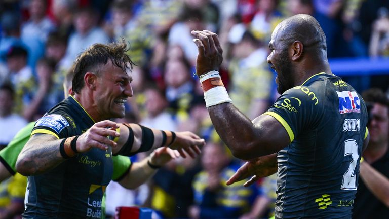 Picture by Olly Hassell/SWpix.com - 18/06/2026 - Rugby League - Betfred Super League Round 15 - Warrington Wolves v Leeds Rhinos - Halliwell Jones Stadium, Warrington, England - Maika Sivo of Leeds celebrating his try with Chris Hankinson of Leeds