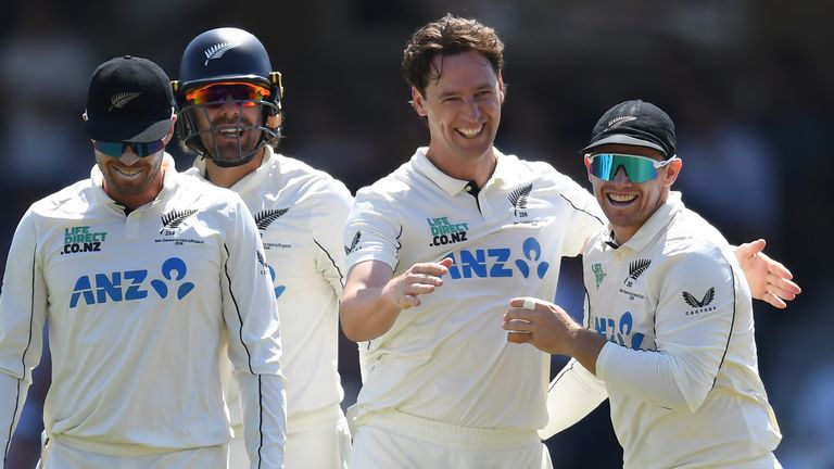 LONDON, ENGLAND - JUNE 19: Matt Henry (2nd R) and Tom Latham (R) of New Zealand celebrate after the dismissal of Josh Tongue of England duri