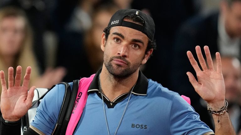 Italy's Matteo Berrettini walks off the becouse of an injury during the quarterfinal tennis match against Italy's Matteo Arnaldi at the French Open in Paris, Wednesday, June 3, 2026. (AP Photo/Christophe Ena)