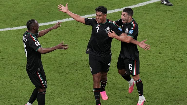 Mexico's Luis Romo (7) celebrates with Julian Quinones, left, and Erik Lira (6) after scoring the opening goal during the World Cup Group A soccer match between Mexico and South Korea in Zapopan, near Guadalajara, Mexico, Thursday, June 18, 2026. (AP Photo/Silvia Izquierdo)