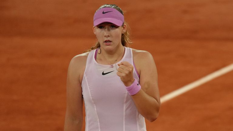 Russia's Mirra Andreeva reacts during the quarterfinal tennis match against Romania's Sorana Cirstea at the French Open in Paris, Tuesday, J