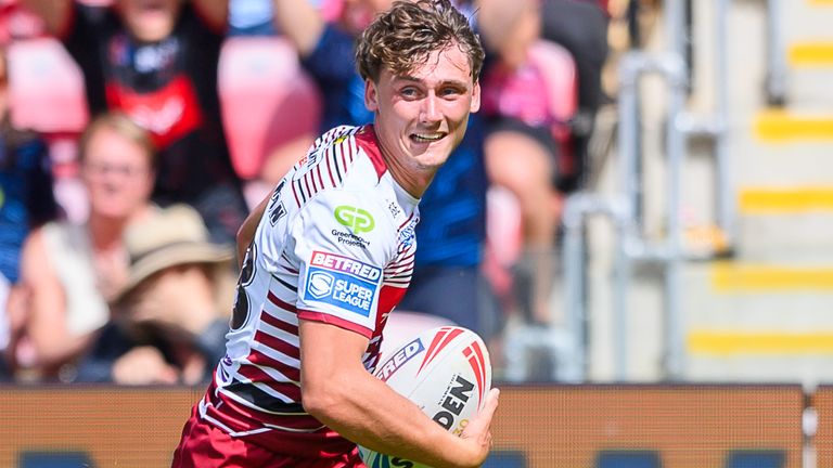 Wigan's Noah Hodkinson scores his second try of the match against York