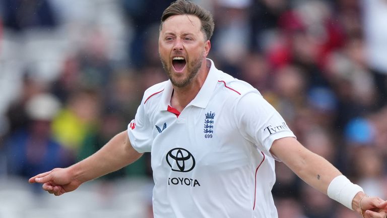 Ollie Robinson picked up the wickets of Rachin Ravindra and Daryl Mitchell in the brief play that was possible on day three at Lord's 
