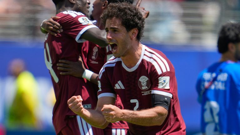 Qatar's Ahmed Alaaeldin celebrates after the World Cup match against Switzerland 