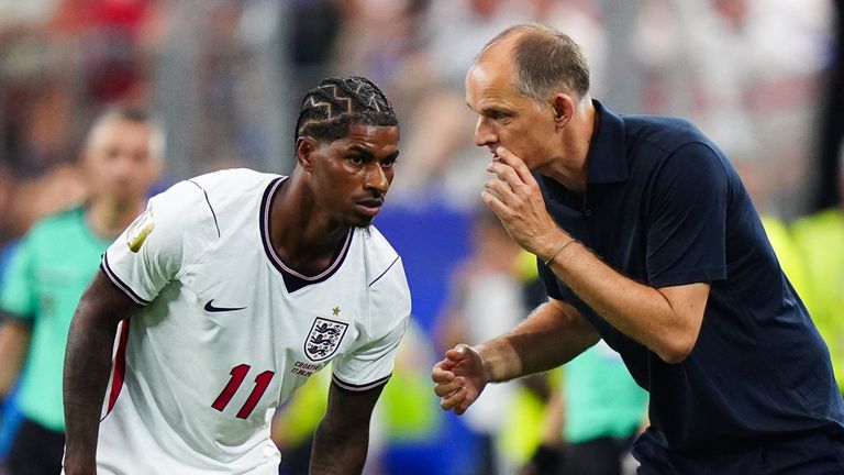 England boss Thomas Tuchel talks to Marcus Rashford during the win over Croatia