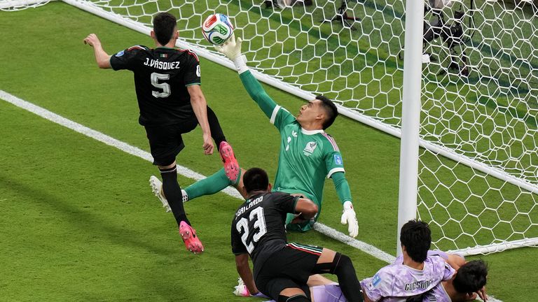 Mexico goalkeeper Raul Rangel, middle, reaches to stop the ball during the World Cup Group A soccer match between Mexico and South Korea in Zapopan, near Guadalajara, Mexico, Thursday, June 18, 2026. (AP Photo/Silvia Izquierdo)