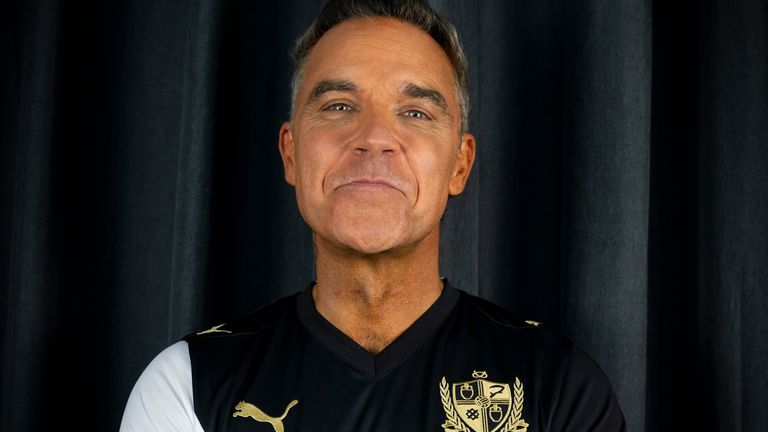 Robbie Williams will be have his logo on the front of Port Vale shirts after becoming Port Vale Foundation Ambassador