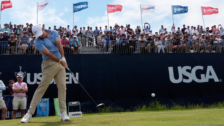 Rory McIlroy hits his tee shot on the 12th hole during a practice round