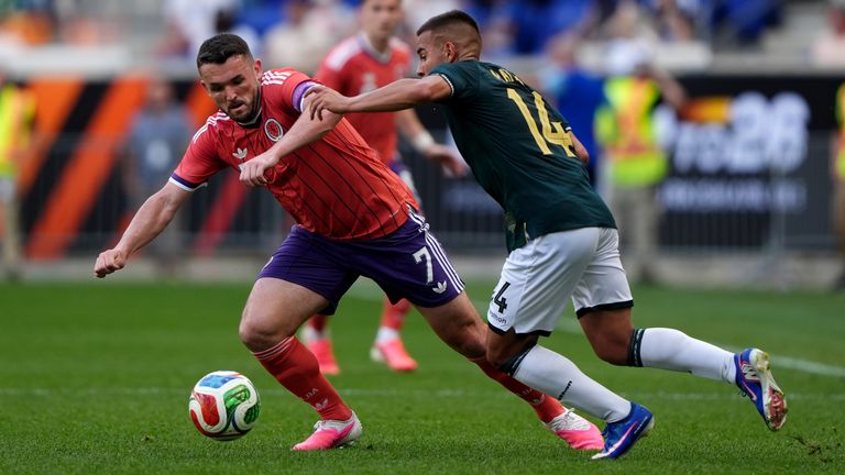 John McGinn in action for Scotland against Bolivia 