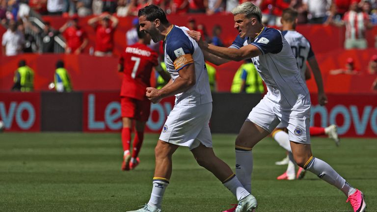 Bosnia-Herzegovina's Sead Kolasinac celebrates a decisive block against Canada