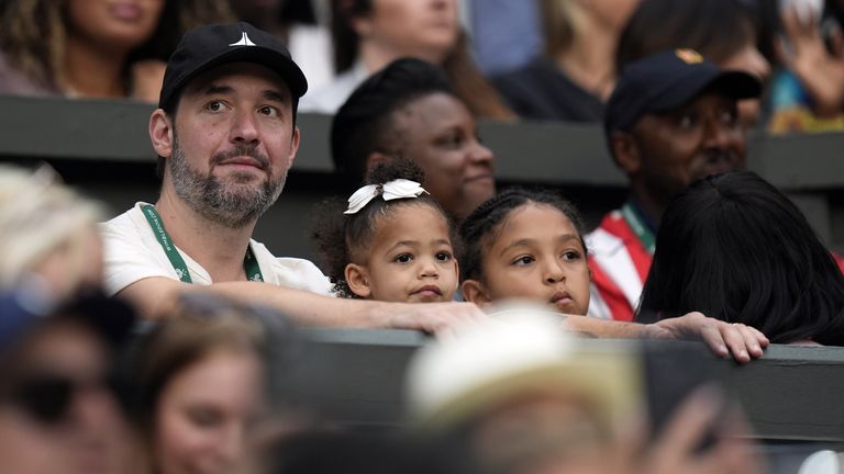 Serena Williams is cheered on by her family in her corner on Centre Court