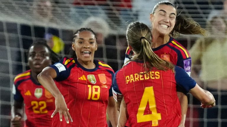Spain's Patri Guijarro celebrates with teammate Irene Paredes after scoring the opening goal during the 2027 Women's World Cup qualifying soccer match between Spain and England in Mallorca, Spain, Friday, June 5, 2026. (AP Photo/Joan Mateu Parra)