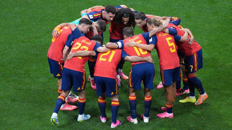 Spain players huddle ahead of their World Cup opener vs Cape Verde 