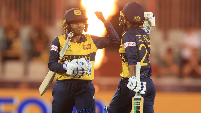 Sri Lanka's Sugandika Kumari and Nilakshika Silva celebrate winning run after the ICC Women's T20 World Cup match at Emirates Old Trafford, 