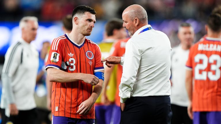 Steve Clarke speaks to captain Andy Robertson at full time
