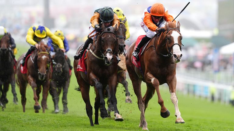 Ten Bob Tony (right) struck gold at Epsom