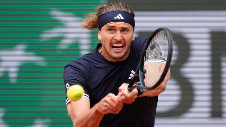 Germany's Alexander Zverev returns to Czech Republic's Jakub Mensik during the semifinal tennis match at the French Open in Paris, Friday, J