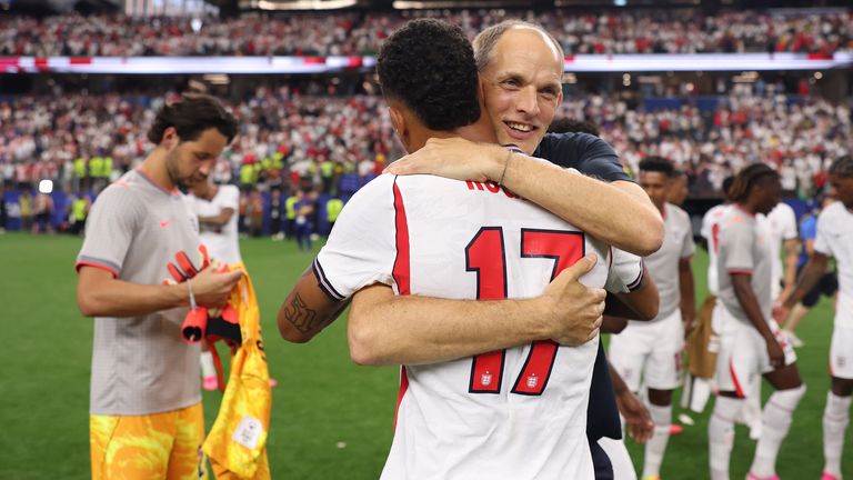 Thomas Tuchel celebrates with Morgan Rogers after England's 4-2 win against Croatia