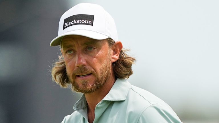 Tommy Fleetwood, of England, waves after his putt on the third hole during the second round of the U.S. Open golf tournament 