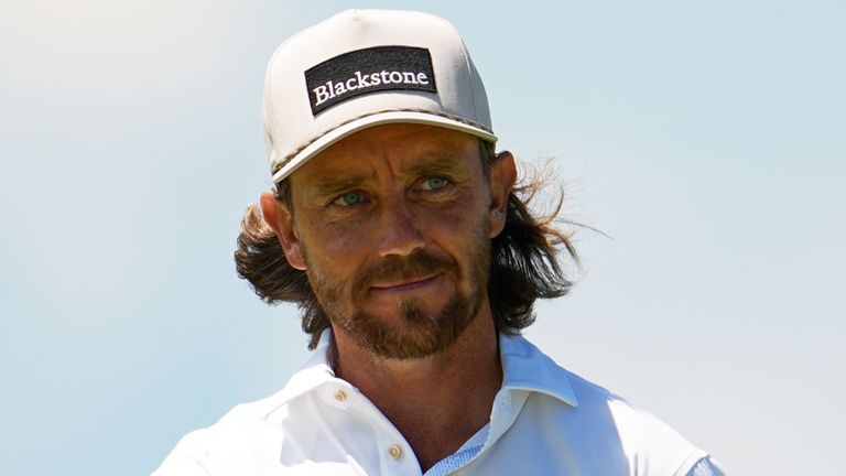 Tommy Fleetwood, of England, celebrates after a birdie on the second hole during the final round of the U.S. Open