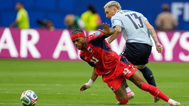 Cape Verde's Garry Rodrigues  and Uruguay's Guillermo Varela battle for the ball 