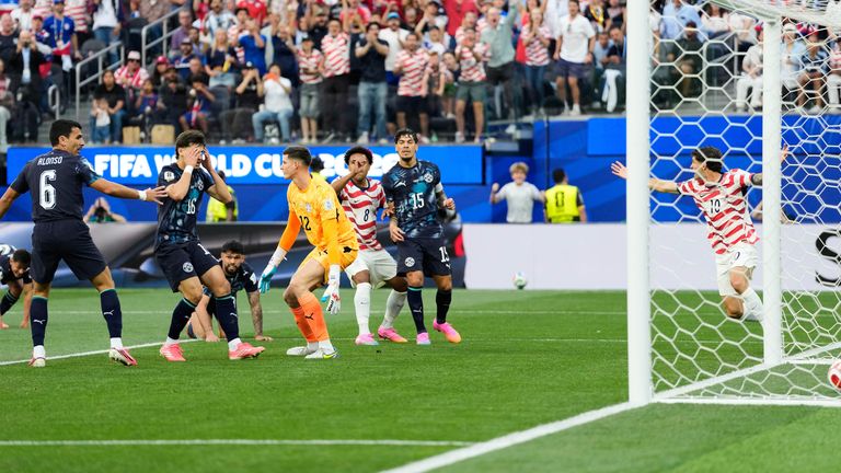Paraguay's Damian Bobadilla (16) reacts afer scoring an on goal during the World Cup Group D soccer match against United States in Inglewood, Calif., near Los Angeles, Friday, June 12, 2026. (AP Photo/Andre Penner)