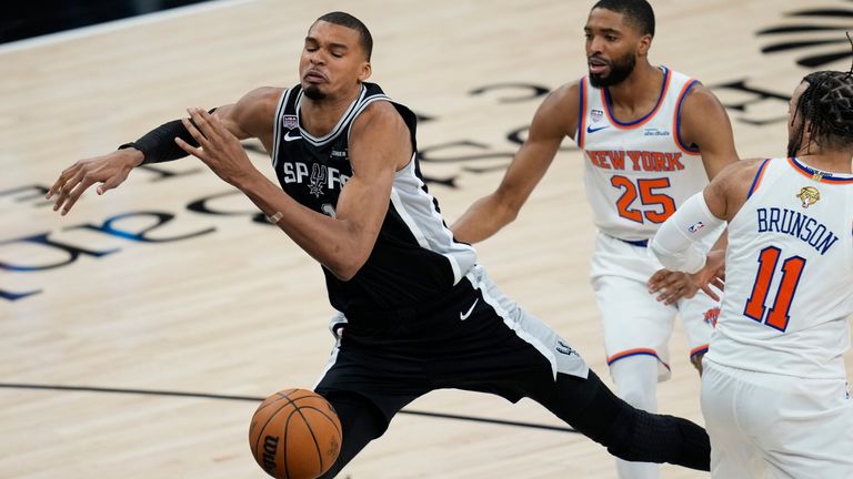 San Antonio Spurs forward Victor Wembanyama has the ball knocked loose during the second half (AP Photo/David J. Phillip)