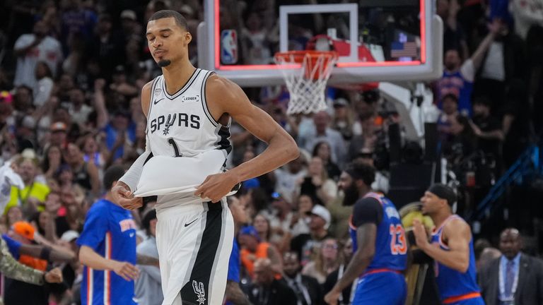 San Antonio Spurs forward Victor Wembanyama walks off the court as time expires during the second half of Game 2 of the NBA Finals basketball series against the New York Knicks, Friday, June 5, 2026, in San Antonio. (AP Photo/Eric Gay)