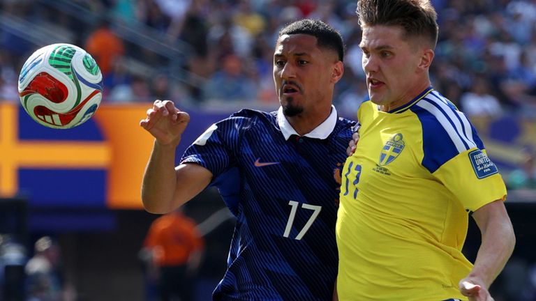 France's William Saliba (17) challenges for the ball with Sweden's Viktor Gyokeres (17) during the World Cup round of 32 soccer match between France and Sweden in East Rutherford, N.J., near New York, Tuesday, June 30, 2026. (AP Photo/Pamela Smith)