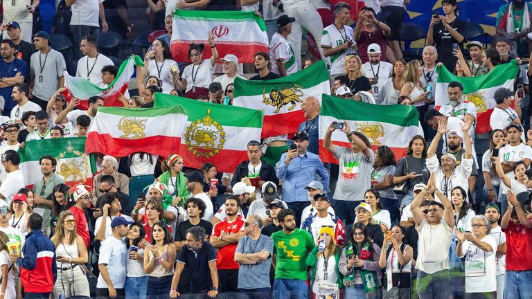 IR Iran' Ali Alipour (11) collides with New Zealand' Ryan Thomas (23) during the FIFA World Cup Group G soccer match between the IR Iranand the New Zealand at SoFi Stadium in Inglewood, Calif., Monday, June 15, 2026. (Ringo Chiu via AP)