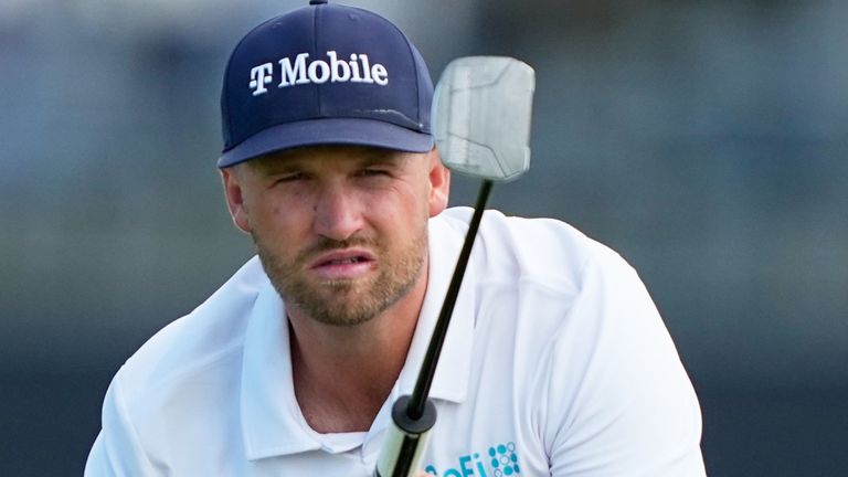 Wyndham Clark lines up a putt on the second hole during the third round of the U.S. Open