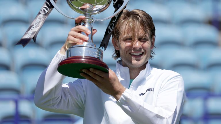 Zizou Bergs poses with the trophy after defeating Ugo Humbert in the Men's Singles Final on day seven of the Lexus Eastbourne Open 