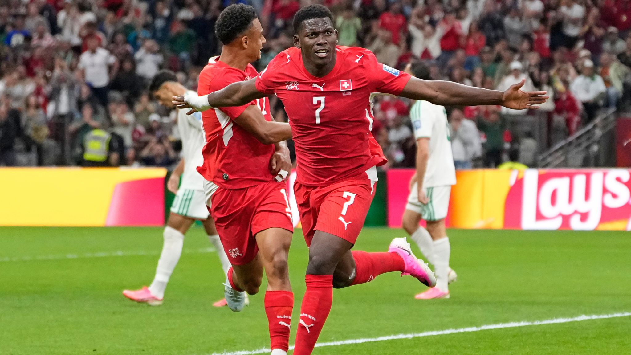 Switzerland's Breel Embolo (7) celebrates after scoring his team's first goal during the World Cup round of 32 soccer match between Switzerland and Algeria in Vancouver, British Columbia, Thursday, July 2, 2026. (AP Photo/Lindsey Wasson)